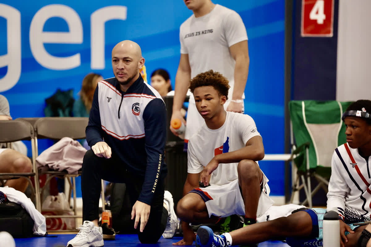 Coach Palmer with Jekai at UCD 2025
