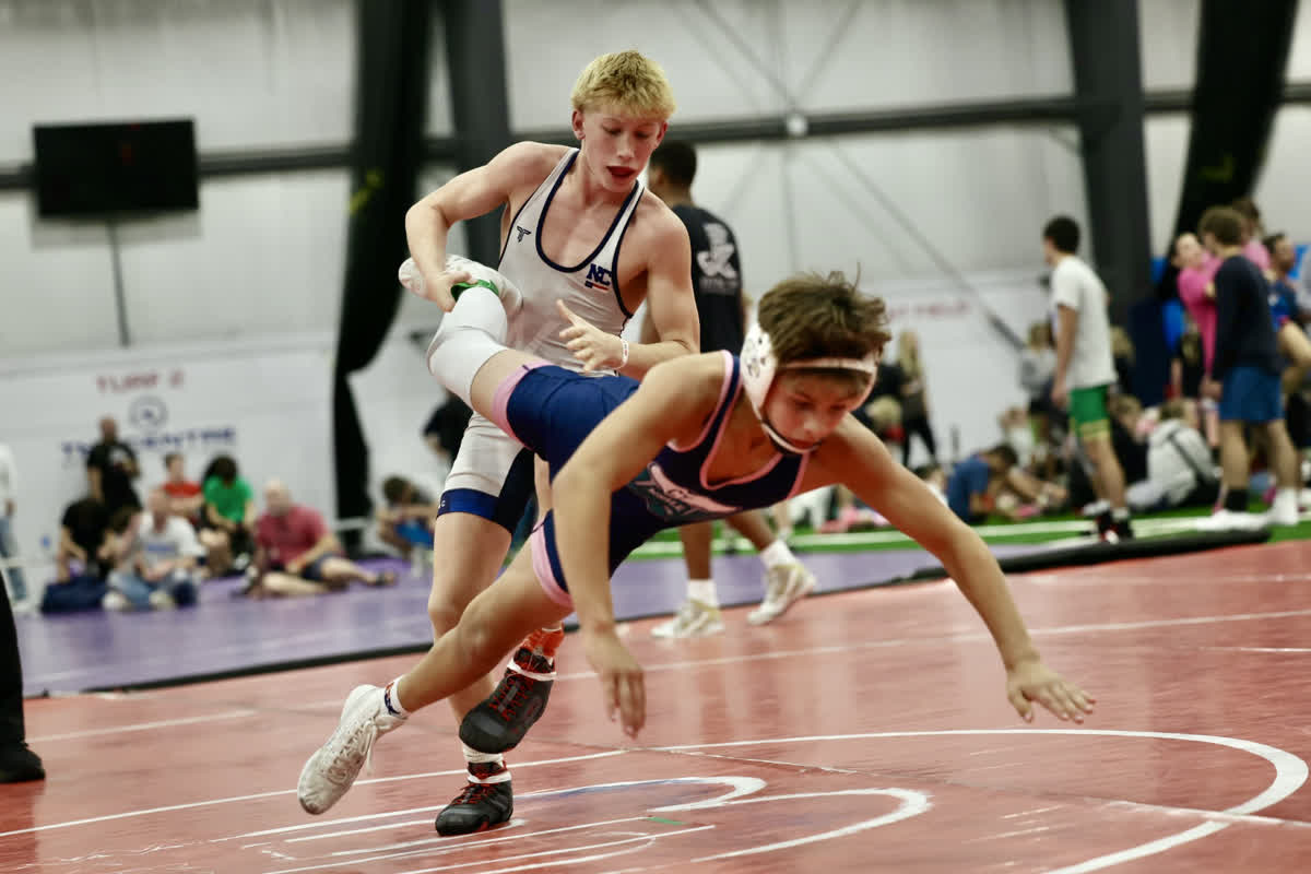 Eli Taylor executing takedown at UCD 2025