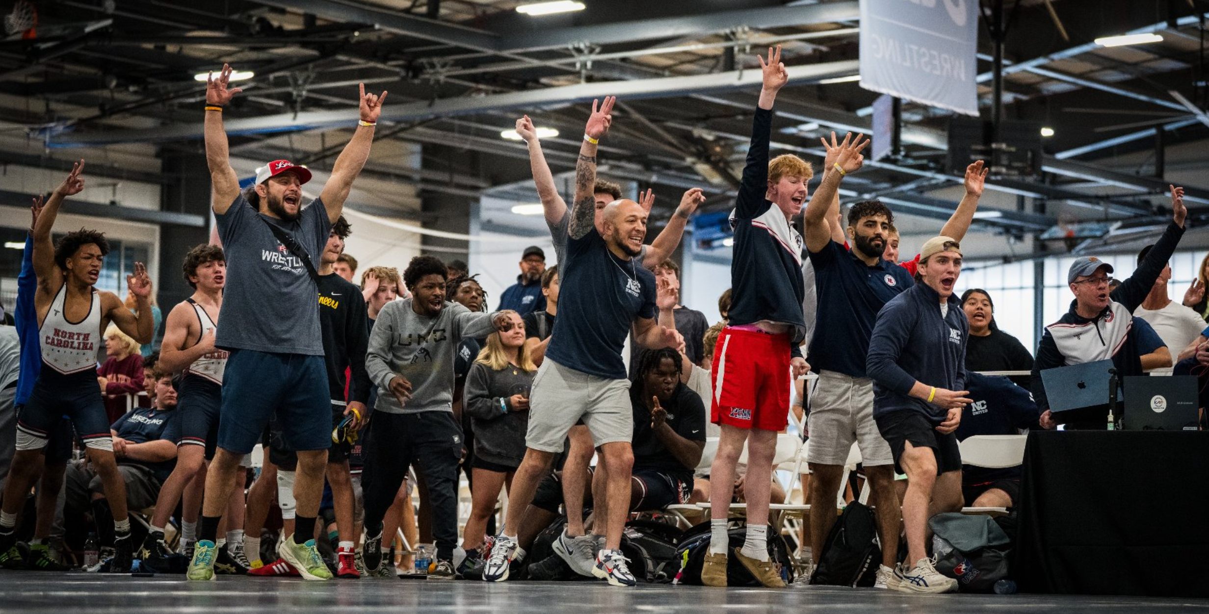 Tye Johnson celebrating victory at NHSCA Duals