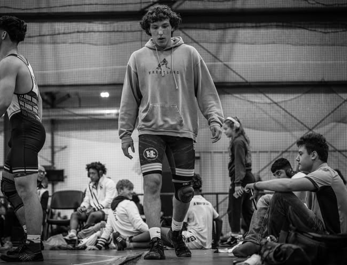 Wrestler in tournament venue - black and white
